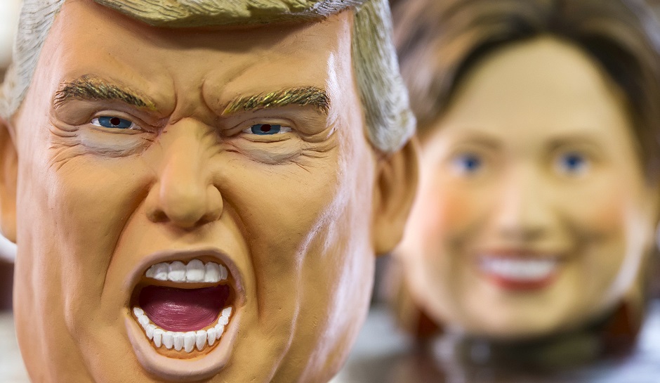 SAITAMA, JAPAN - JUNE 14:  Rubber masks in the likeness of Republican presidential candidate Donald Trump, left, and Democratic presidential candidate Hillary Clinton are seen in this arranged photograph taken at the Ozawa Studios Inc. factory on June 14, 2016 in Saitama, Japan. The rubber mask maker manufactures the masks which go on sale to the local market at the price of 2,400 yen (US$ 22.65) ahead of the U.S. Presidential election.  (Photo by Tomohiro Ohsumi/Getty Images)